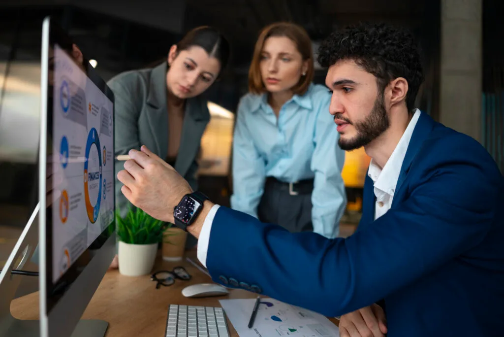 people office analyzing checking finance graphs